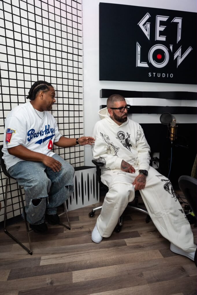 M1 Theking talking with the team at Get Low Studio